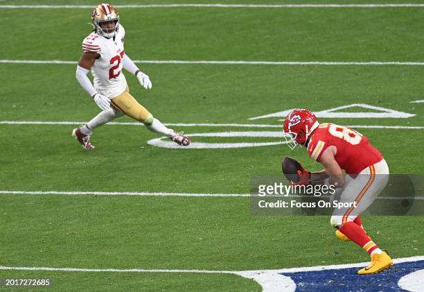Travis Kelce of the Kansas City Chiefs catches a pass against the San Francisco 49ers in overtime during Super Bowl LVIII at Allegiant Stadium on...