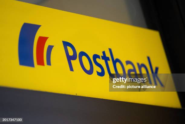 February 2024, Baden-Württemberg, Stuttgart: The Postbank logo can be seen on a branch. Photo: Marijan Murat/dpa