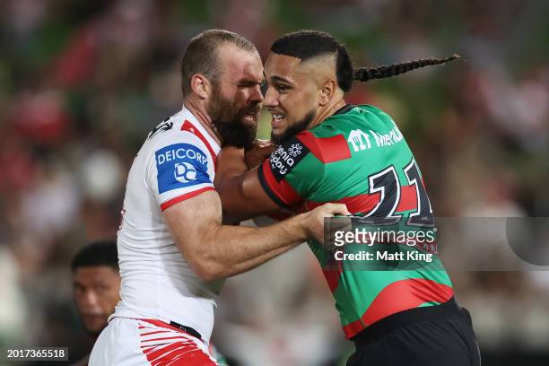 Keaon Koloamatangi of the Rabbitohs is tackled during the NRL Pre-Season Challenge round one match between St George Illawarra Dragons and South...