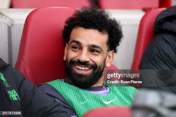 Mohamed Salah of Liverpool looks on from the bench prior to the Premier League match between Brentford FC and Liverpool FC at Gtech Community Stadium...