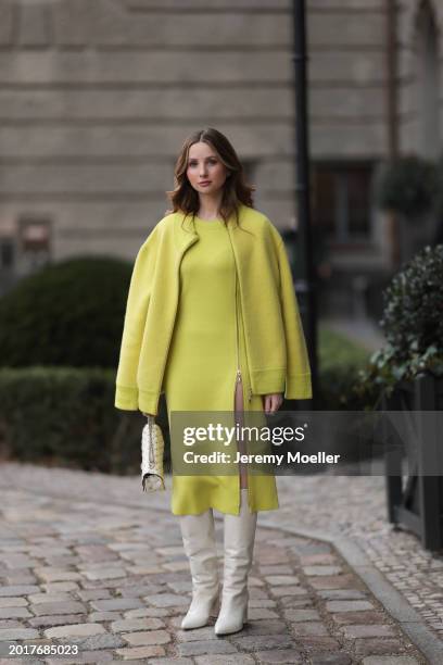 Anna Hiltrop seen wearing Escada yellow / lime green zip midi dress, matching Escada yellow / lime green wool short coat / bomber jacket, Valentino...