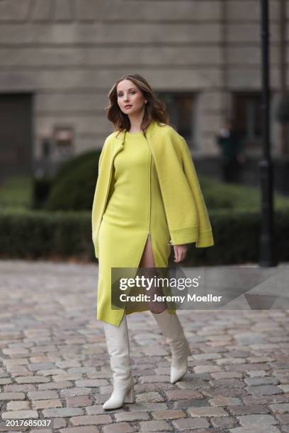 Anna Hiltrop seen wearing Escada yellow / lime green zip midi dress, matching Escada yellow / lime green wool short coat / bomber jacket, Valentino...