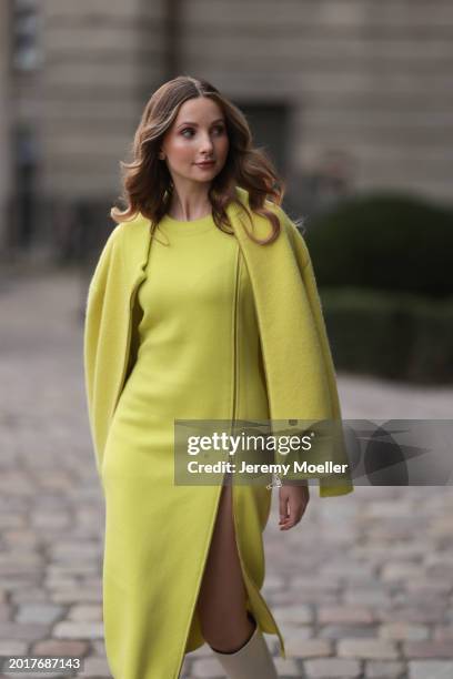 Anna Hiltrop seen wearing Escada yellow / lime green zip midi dress, matching Escada yellow / lime green wool short coat / bomber jacket, Valentino...