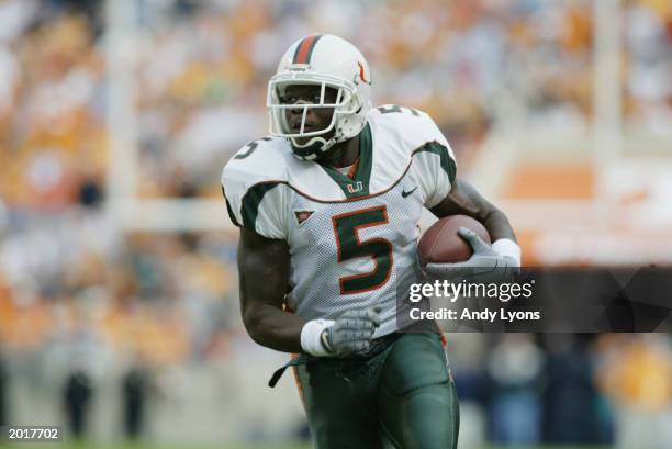 Wide receiver Andre Johnson of Miami carries the ball during the game against the Tennessee on November 9, 2002 at the Neyland Stadium in Knoxville,...