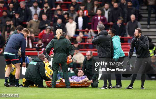Diogo Jota of Liverpool is stretchered off after a challenge with Christian Norgaard during the Premier League match between Brentford FC and...