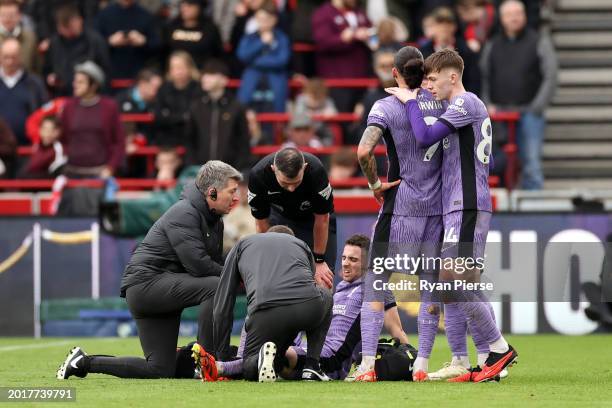 Diogo Jota of Liverpool is stretchered off after a challenge with Christian Norgaard during the Premier League match between Brentford FC and...