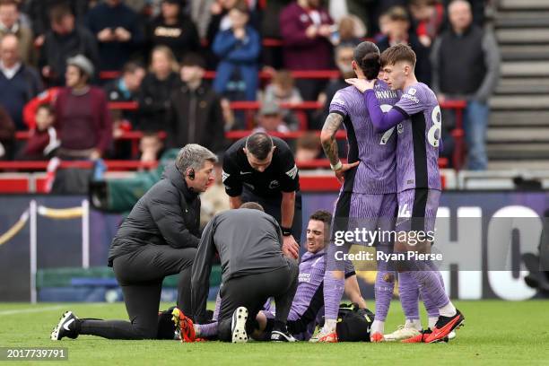 Diogo Jota of Liverpool is stretchered off after a challenge with Christian Norgaard during the Premier League match between Brentford FC and...