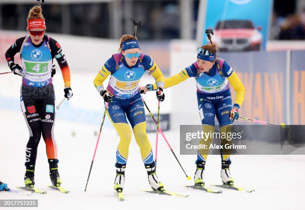 Linn Persson of Sweden hands over to Hanna Oeberg of Sweden during the Women's Relay in the IBU World Championships Biathlon Nove Mesto na Morave on...