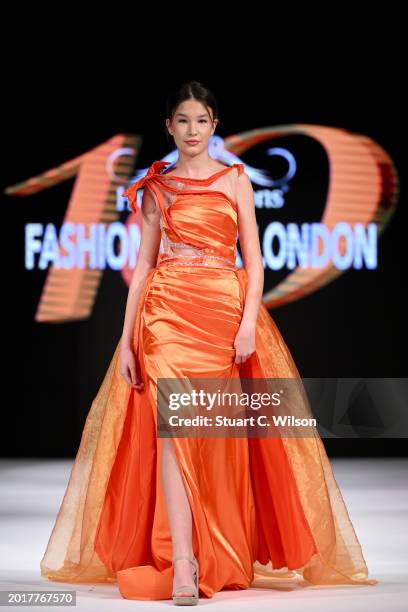 Model walks the runway for CLC Couture at the House of iKons show during London Fashion Week February on February 17, 2024 in London, England.