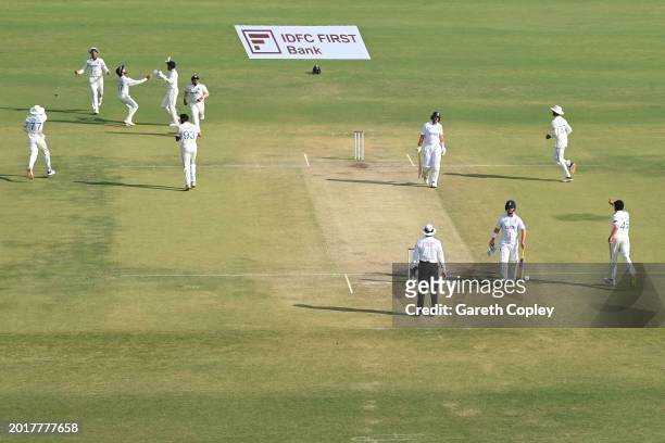 Joe Root of England is caught out by Yashasvi Jaiswal of India from the bowling of Jasprit Bumrah during day three of the 3rd Test Match between...
