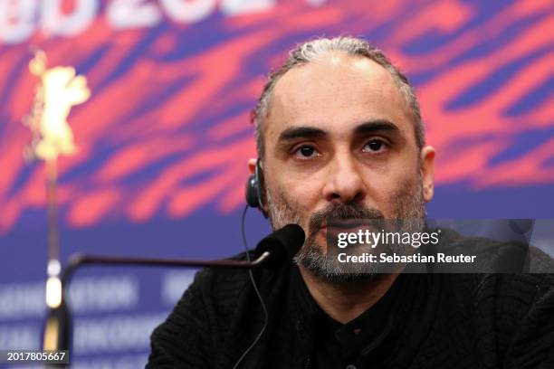 Piero Messina speaks at the "Another End" press conference during the 74th Berlinale International Film Festival Berlin at Grand Hyatt Hotel on...