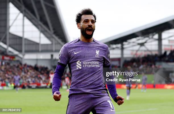 Mohamed Salah of Liverpool celebrates after scoring his team's third goal during the Premier League match between Brentford FC and Liverpool FC at...