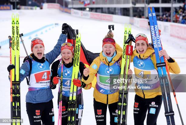 Janina Hettich-Walz, Sophia Schneider, Selina Grotian and Vanessa Voigt of Germany pose for a photo after the Women's Relay in the IBU World...