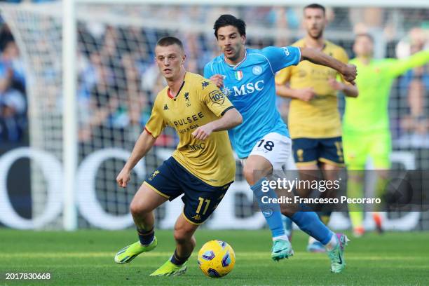 Albert Gudmundsson of Genoa CFC battles for possession with Giovanni Simeone of SSC Napoli during the Serie A TIM match between SSC Napoli and Genoa...