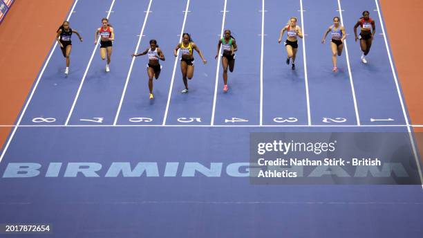 Bianca Williams , Finette Agyapong and Kissiwaa Mensah of Great Britain compete in the Women's 60m Semi-Final during day one of the Microplus UK...