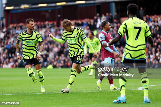 Martin Odegaard of Arsenal celebrates scoring his team's first goal during the Premier League match between Burnley FC and Arsenal FC at Turf Moor on...