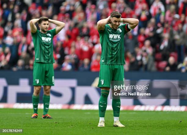 Ermedin Demirovic of FC Augsburg reacts during the Bundesliga match between 1. FSV Mainz 05 and FC Augsburg at MEWA Arena on February 17, 2024 in...