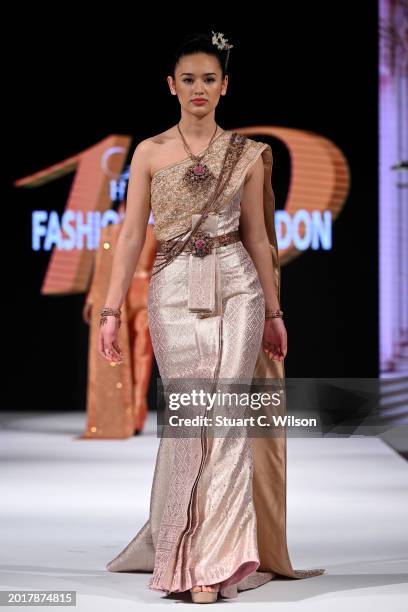 Model walks the runway for Celebration of Thailand; House of iKons Fashion Week London at the House of iKons show during London Fashion Week February...