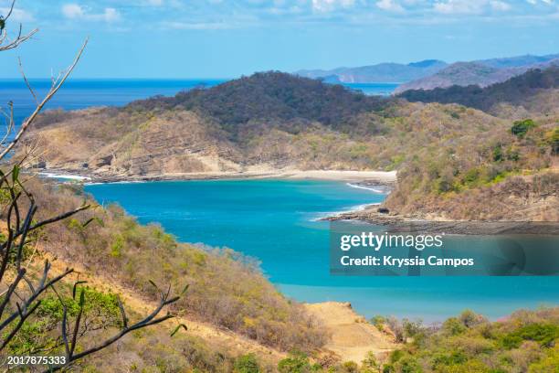 tropical paradise overlook at a beautiful beach - san juan del sur stock pictures, royalty-free photos & images