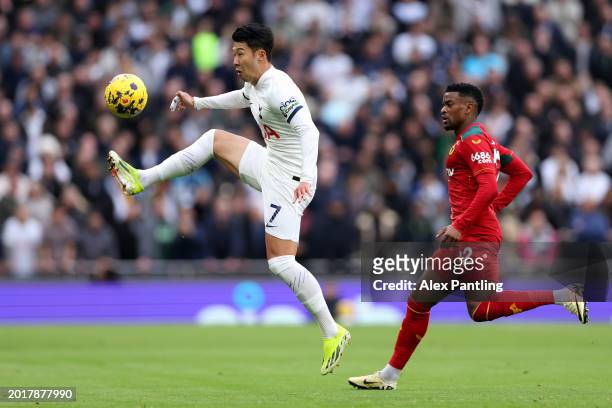 Son Heung-Min of Tottenham Hotspur controls the ball from Nelson Semedo of Wolverhampton Wanderers during the Premier League match between Tottenham...