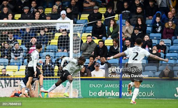 Iké Ugbo of Sheffield Wednesday celebrates after scoring his sides first goal during the Sky Bet Championship match between Millwall and Sheffield...