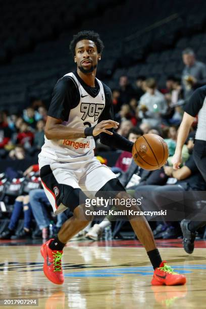 Kobi Simmons of the Raptors 905 brings the ball up court during the game against the Windy City Bulls on February 11, 2024 at NOW Arena in Hoffman...