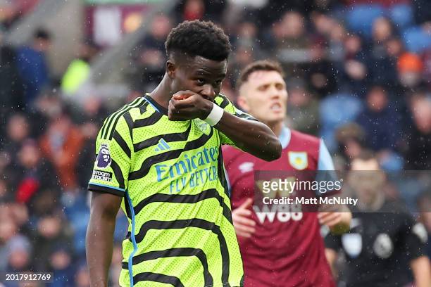 Bukayo Saka of Arsenal celebrates after scoring his team's second goal from the penalty spot during the Premier League match between Burnley FC and...
