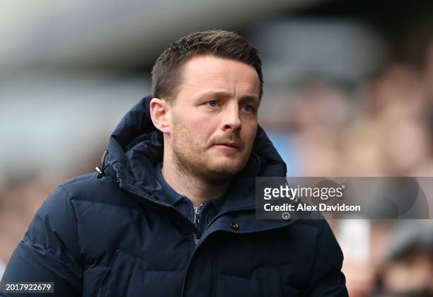 Millwall Manager, Joe Edwards looks on during the Sky Bet Championship match between Millwall and Sheffield Wednesday at The Den on February 17, 2024...