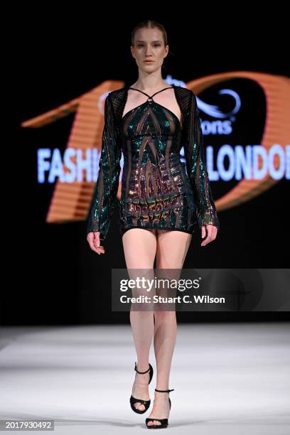 Model walks the runway for Anna Flowers Designs at the House of iKons show during London Fashion Week February on February 17, 2024 in London,...