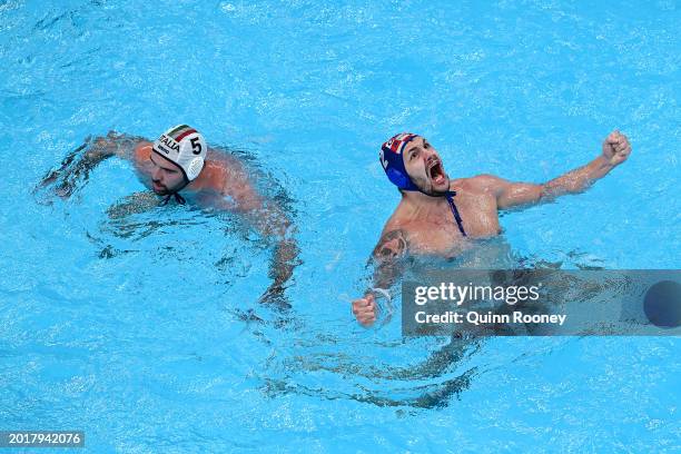 Andrea Fondelli of Team Italy looks dejected as Rino Buric of Team Croatia celebrates a point in the Men's Water Polo Gold Medal Match between Team...