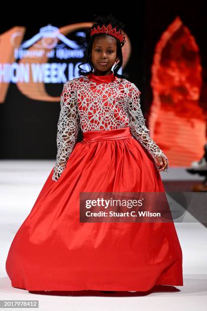 Model walks the runway for YS Clothier Represented by The Fashion Life Tour at the House of iKons show during London Fashion Week February on...