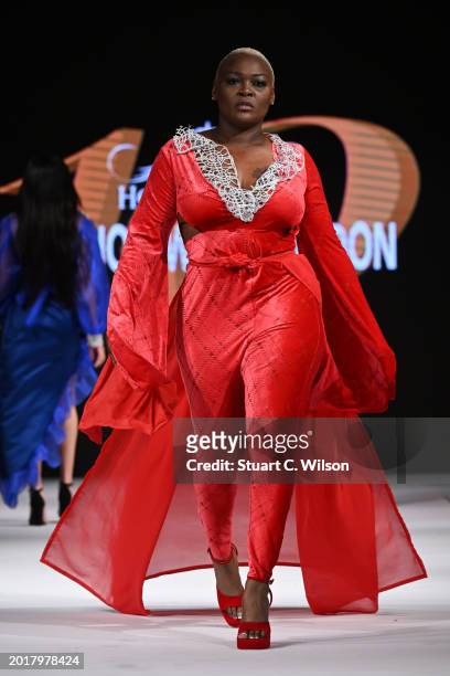 Model walks the runway for YS Clothier Represented by The Fashion Life Tour at the House of iKons show during London Fashion Week February on...
