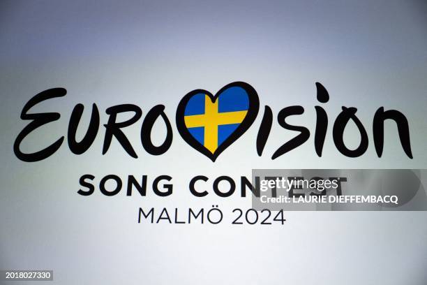 This photograph taken on February 20, 2024 shows the logo of the Eurovision 2024 displayed during a press conference of Belgian singer actor and...