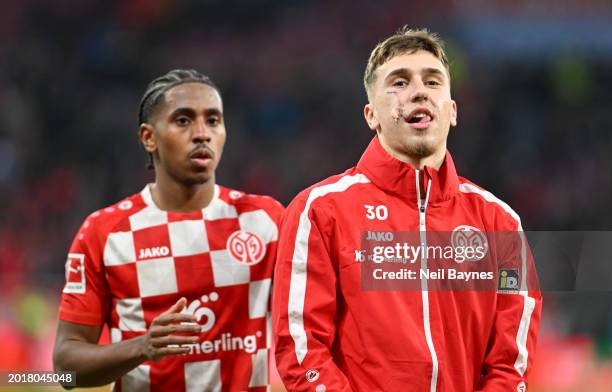 Silvan Widmer and Leandro Barreiro of 1.FSV Mainz 05 look on after the Bundesliga match between 1. FSV Mainz 05 and FC Augsburg at MEWA Arena on...