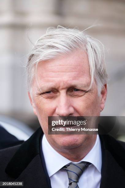 King Philippe of Belgium is talking with citizens at the end of the annual mass at the Notre-Dame church in Laeken, in memory of the deceased members...