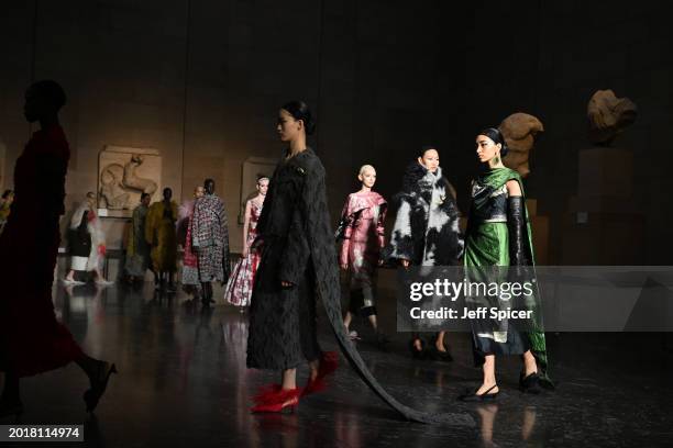 Models walk the runway in the finale at the ERDEM show during London Fashion Week February 2024 at The British Museum on February 17, 2024 in London,...