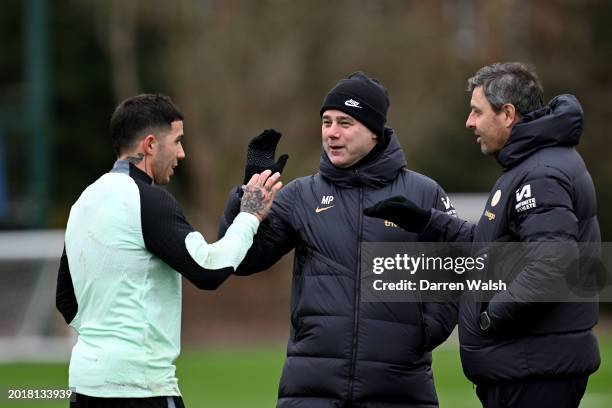 Enzo Fernandez, Head Coach Mauricio Pochettino and Assistant 1st Team Coach Miguel D'Agostino of Chelsea during a training session at Chelsea...