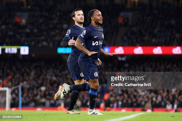 Raheem Sterling of Chelsea celebrates with teammate Ben Chilwell after scoring his team's first goal during the Premier League match between...