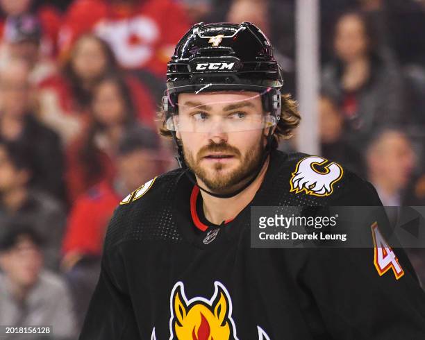 Rasmus Andersson of the Calgary Flames in action against the Chicago Blackhawks during an NHL game at Scotiabank Saddledome on January 27, 2024 in...