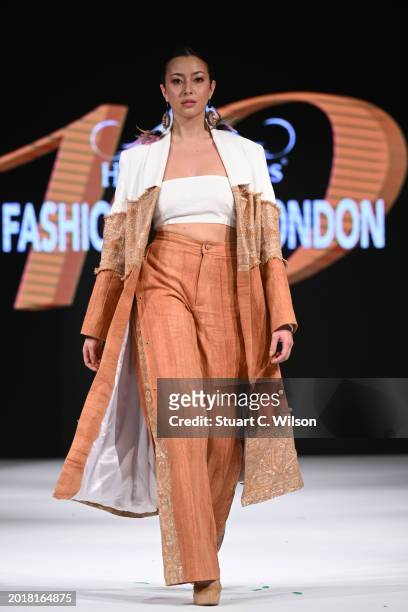 Model walks the runway for La Pham at the House of iKons show during London Fashion Week February on February 17, 2024 in London, England.