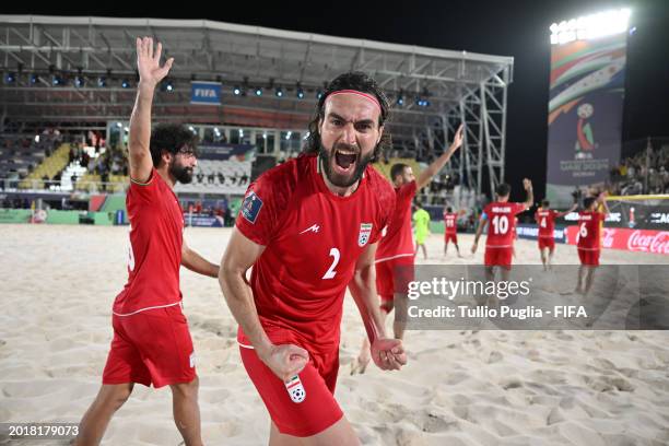 Amirhosein Akbari of Iran celebrates after winning the FIFA Beach Soccer World Cup UAE 2024 Group B match between Argentina and IR Iran at Dubai...
