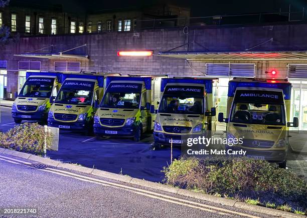 Ambulances queue outside the accident and emergency department of the Bath Royal United Hospital, on February 16, 2024 in Bath, England. In many...