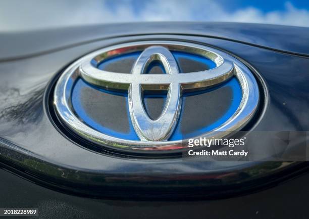 The logo of the Honda Motor Company is embossed on the steering wheel of a Toyota car on February 17, 2024 in Bath, England. Founded in 1937, the...
