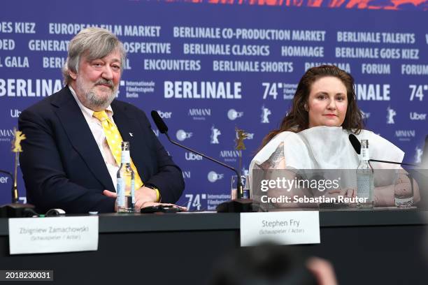 Stephen Fry and Lena Dunham speak at the "Treasure" press conference during the 74th Berlinale International Film Festival Berlin at Grand Hyatt...