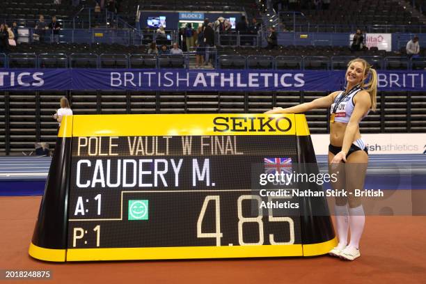 Gold medalist, Molly Caudery of Great Britain, poses for a photo after equalling the national record in the Women's Pole Vault Final on day one of...