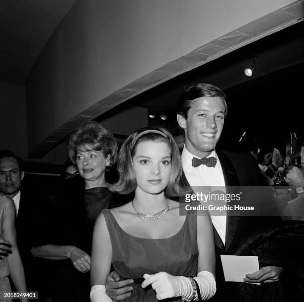 American comedian and actress Lucille Ball, American actor Peter Fonda and his wife, Susan, attend the International premiere of 'The Leopard', held...
