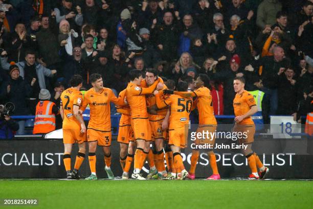 Jacob Greaves of Hull City celebrates with his team mates after scoring the winner in the final minutes during the Sky Bet Championship match between...