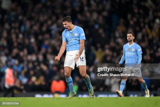 Rodri of Manchester City celebrates after scoring his team's first goal during the Premier League match between Manchester City and Chelsea FC at...