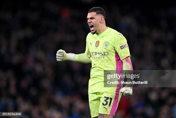 Ederson of Manchester City celebrates after teammate Rodri scores his team's first goal during the Premier League match between Manchester City and...