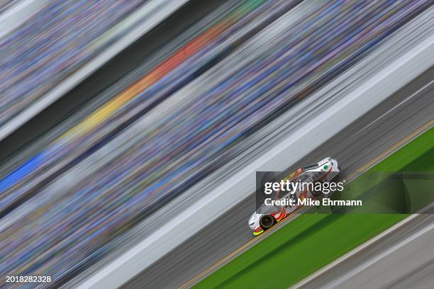 Ryan Ellis, driver of the Heartbeat Hot Sauce Co Chevrolet, drives during qualifying for the NASCAR Xfinity Series United Rentals 300 at Daytona...